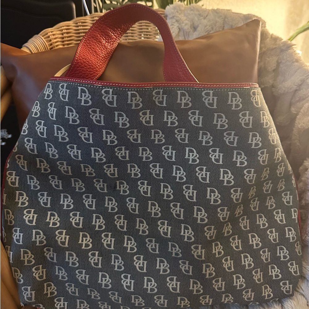 Stylish Monogram Dooney and Bourke Tote Bag trimmed with Red Leather